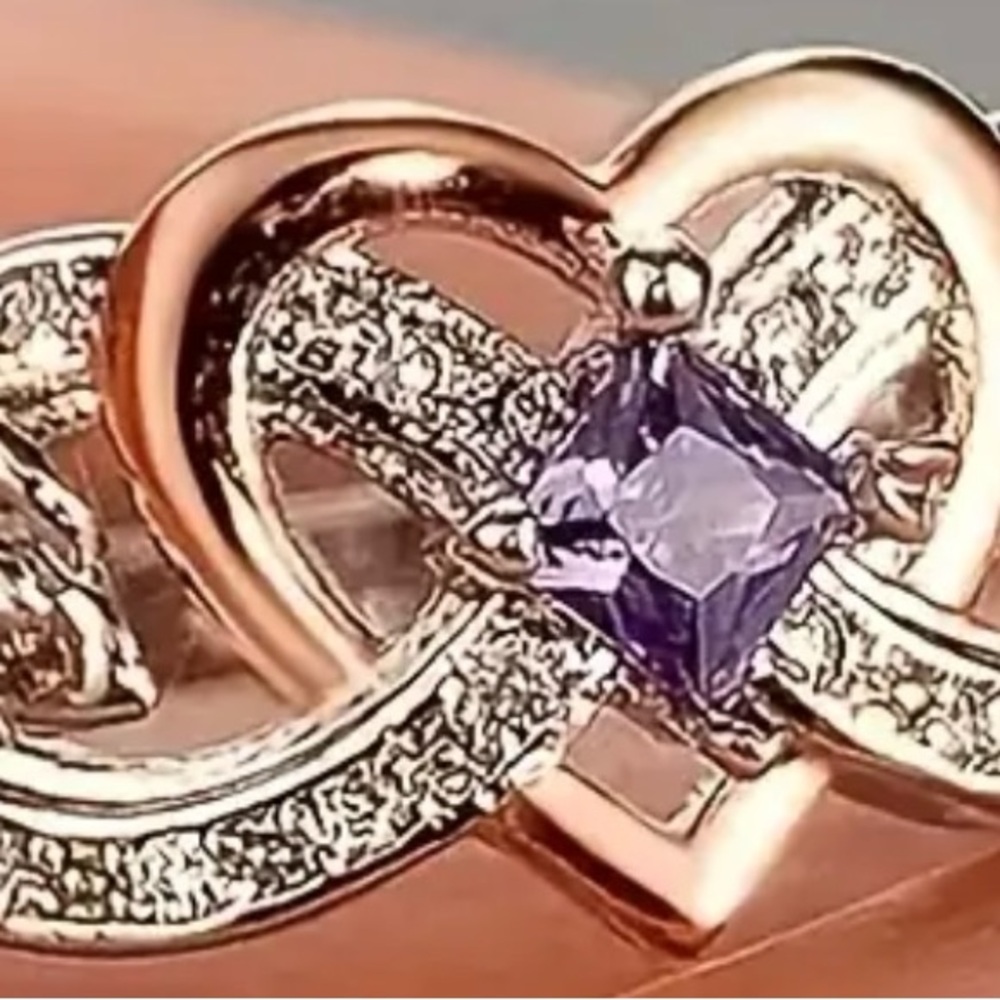 Infinity wedding or engagement ring with Purple Heart